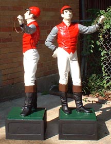 view of front of fully painted jockey statue